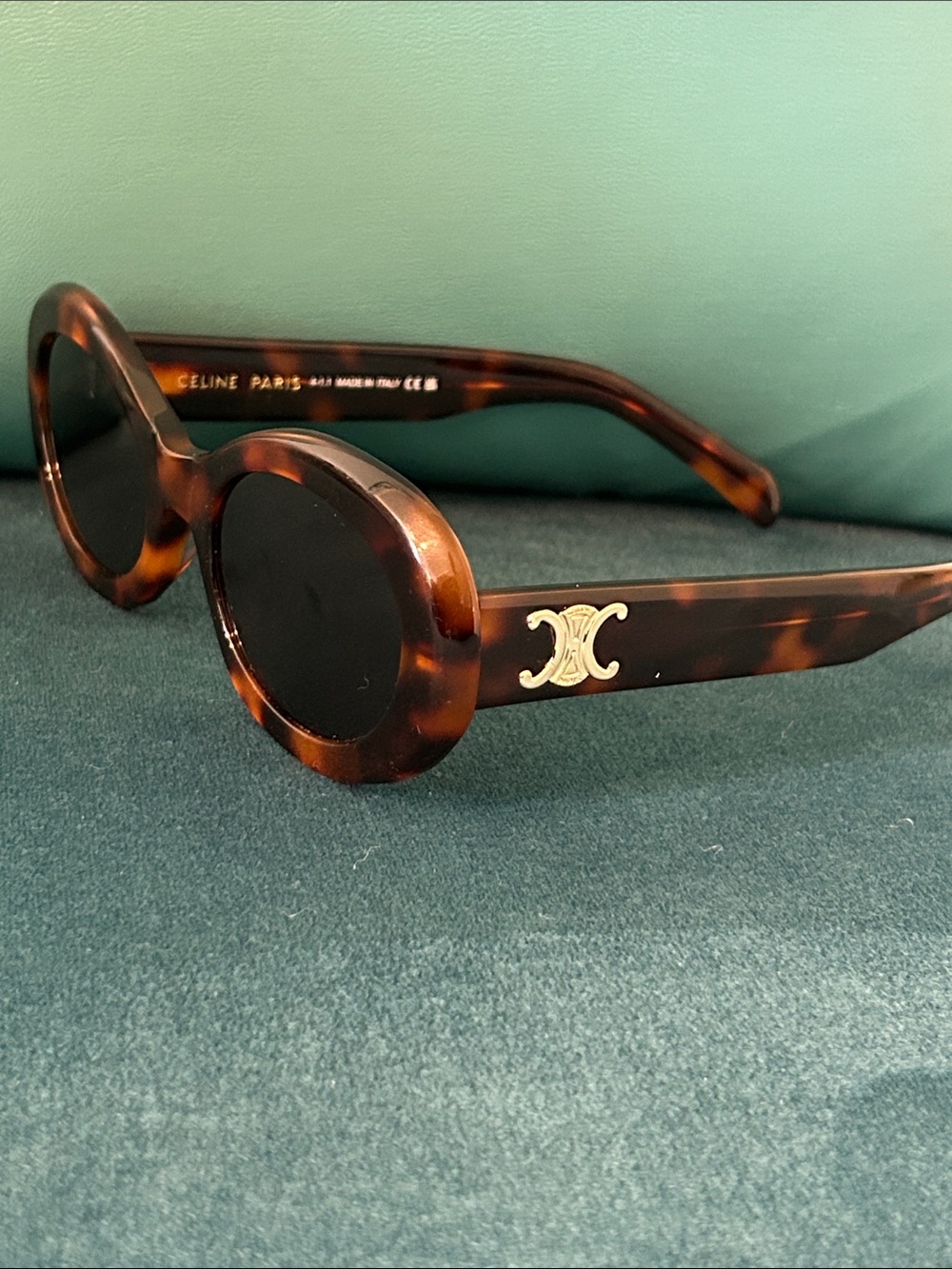 Celine Triomphe Oval Sunglasses in a tortoise acetate frame retail $550